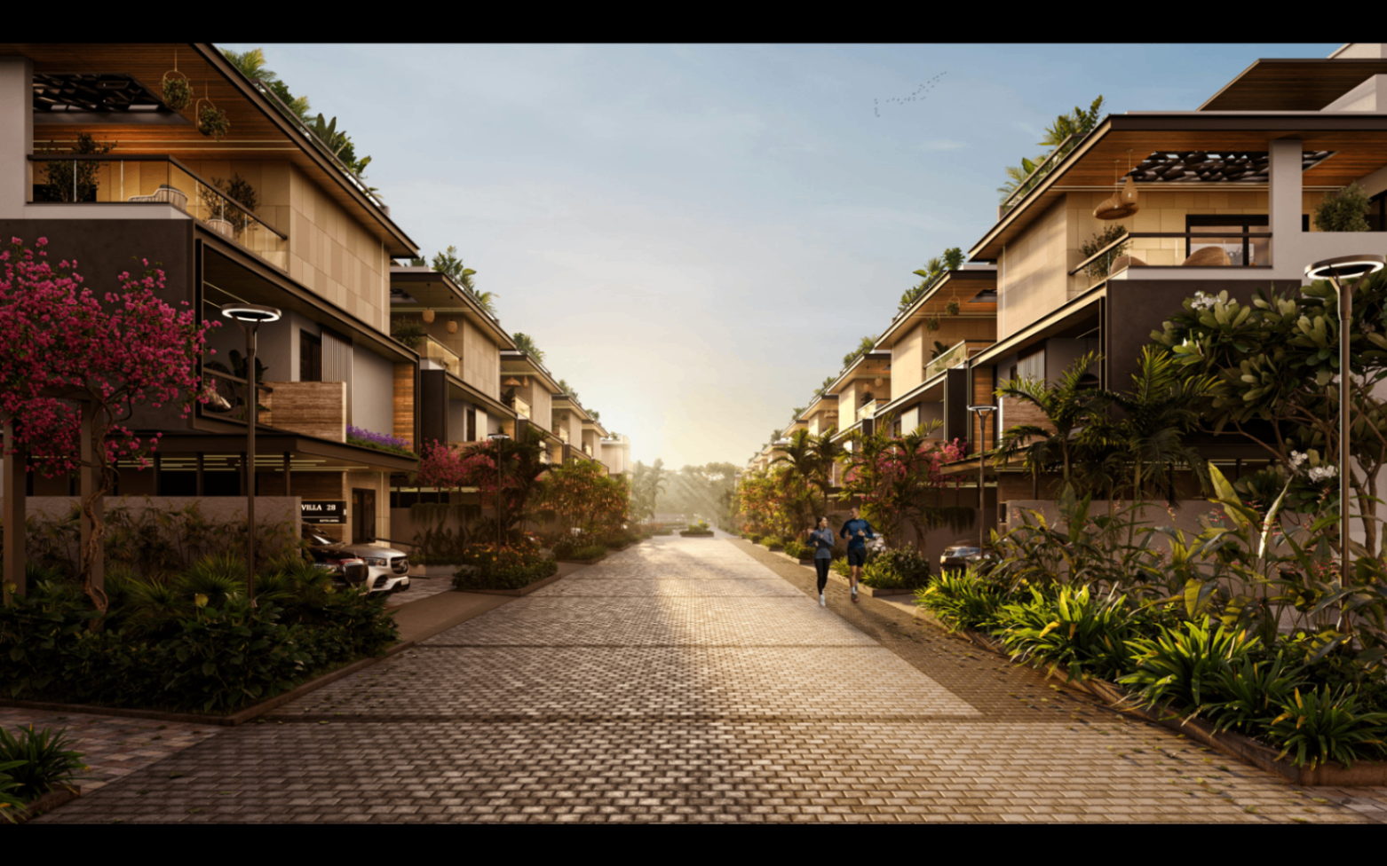 Landscaped boulevard between Satva Amora triplex villas