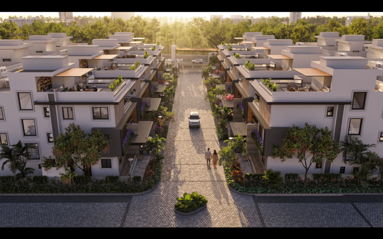 Central avenue view through Satva Amora villa rows at sunrise