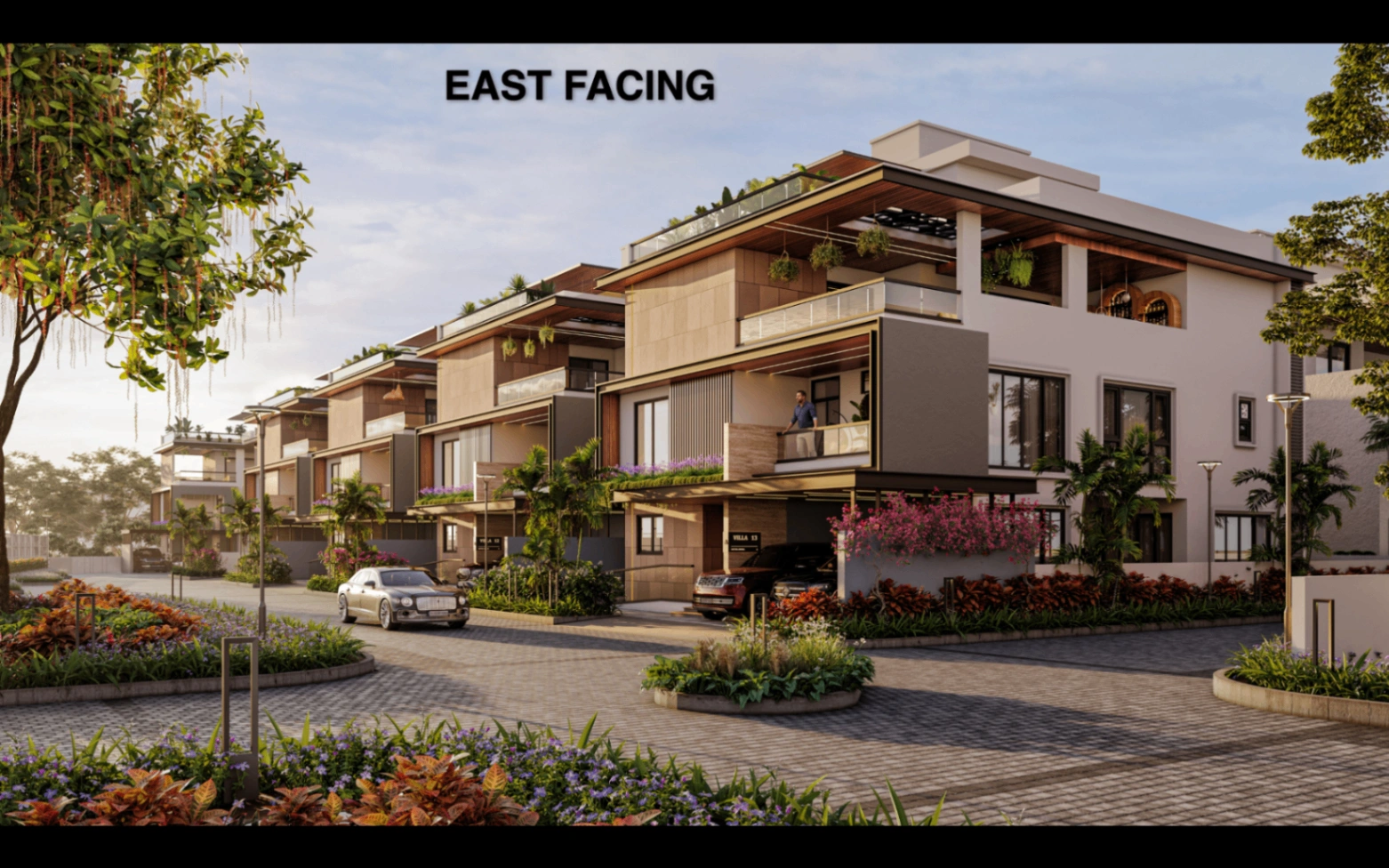 East-facing villa row with landscaped street court at Sattva Amora