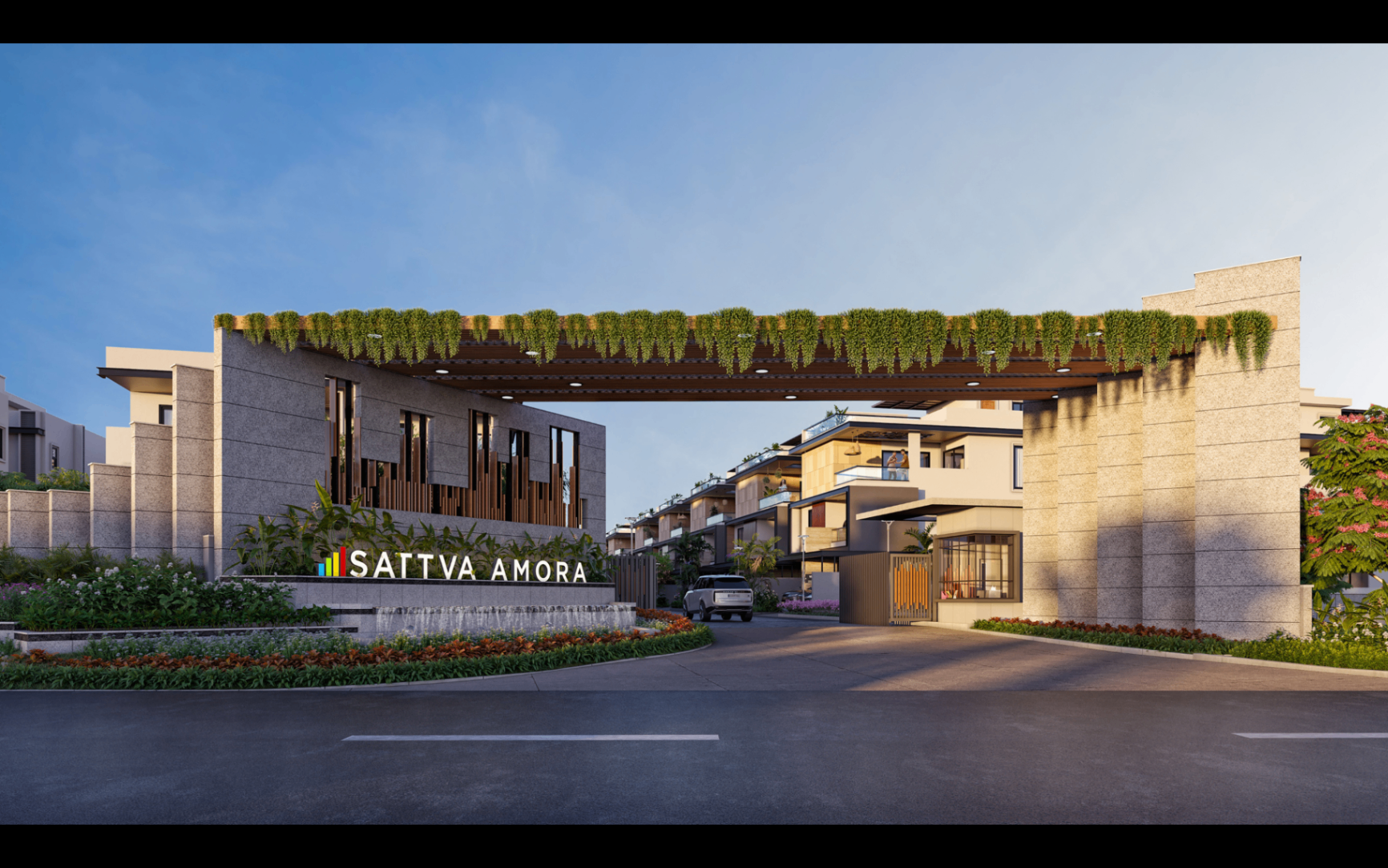 Satva Amora entrance gate with premium stone facade and landscaped arrival