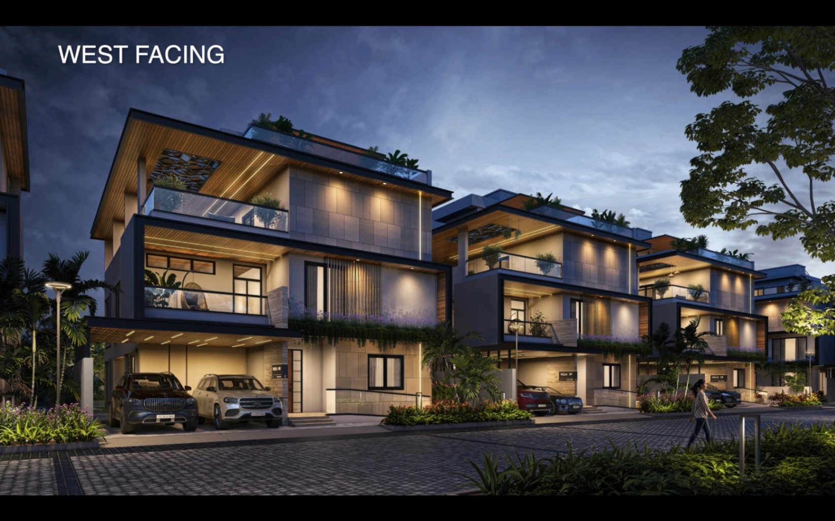 West-facing Sattva Amora villas illuminated at dusk